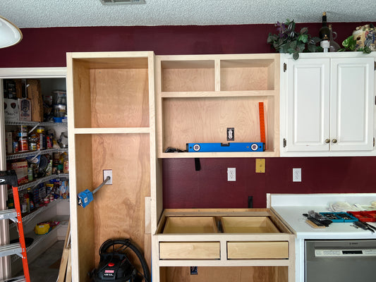 Brand new cabinets merged into an existing kitchen